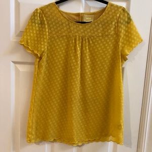 Blouse with scalloped edge